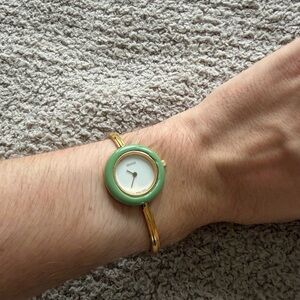 Gucci Gold Green Bezel Watch